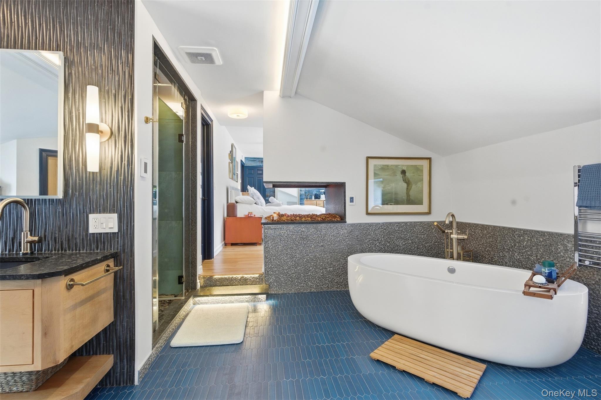 134 Fostertown Road Newburgh, NY 12550 - Photo 29 of 50 a living room with stainless steel appliances granite countertop a refrigerator a sink a stove and white cabinets with wooden floor