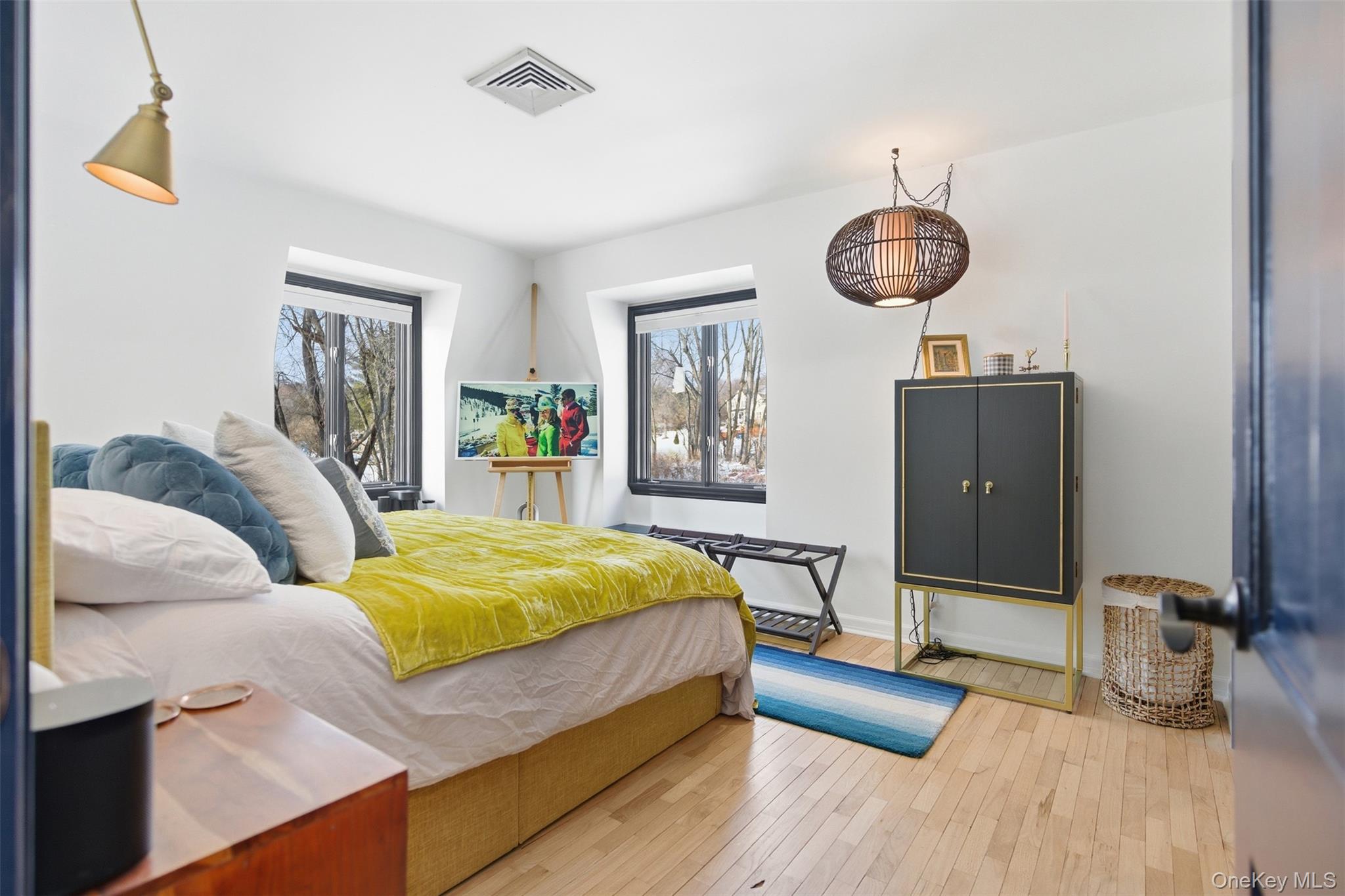 134 Fostertown Road Newburgh, NY 12550 - Photo 39 of 50 a bed room with a bed and a chandelier