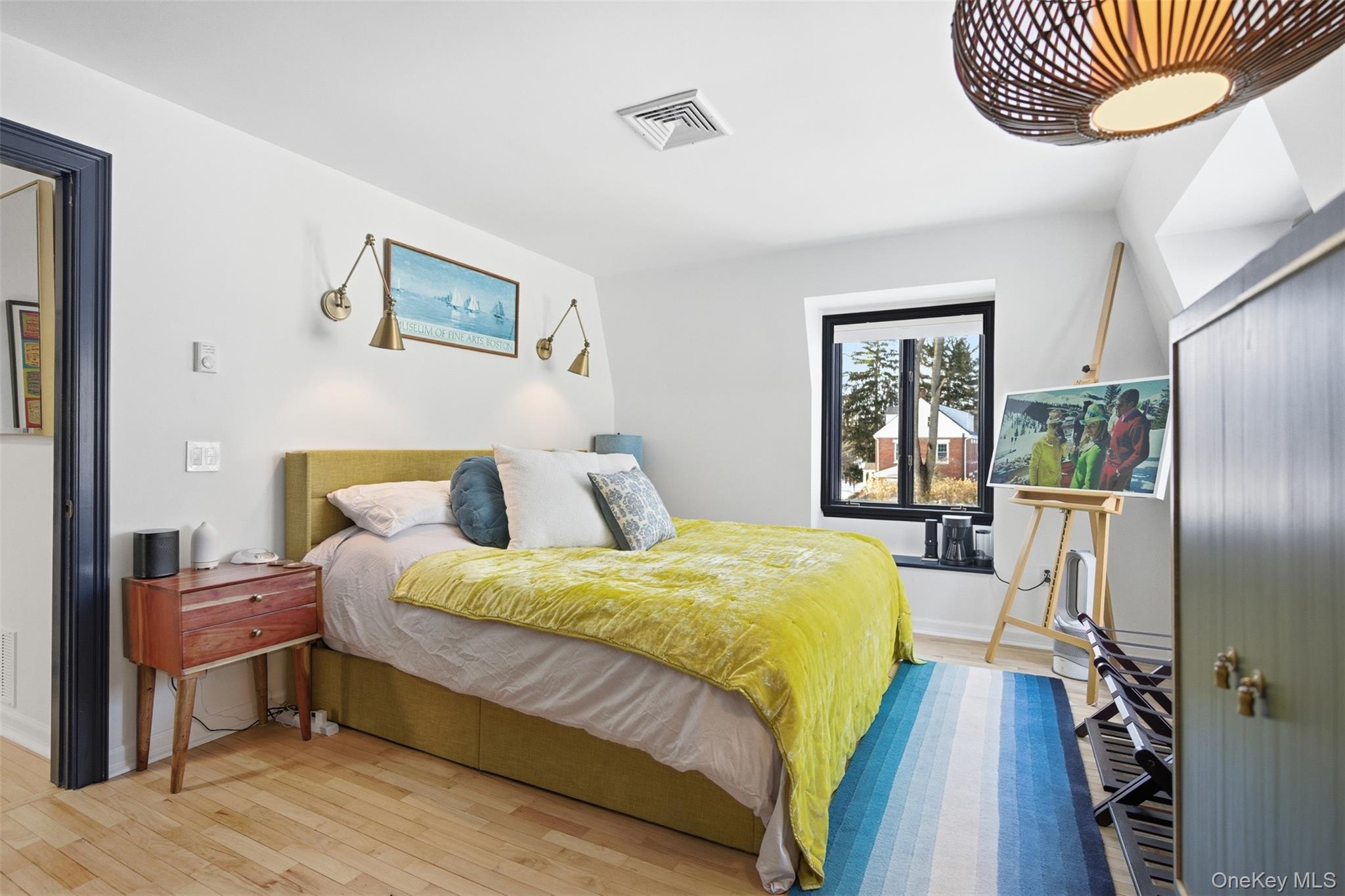 134 Fostertown Road Newburgh, NY 12550 - Photo 40 of 50 a bedroom with a bed and wooden floor