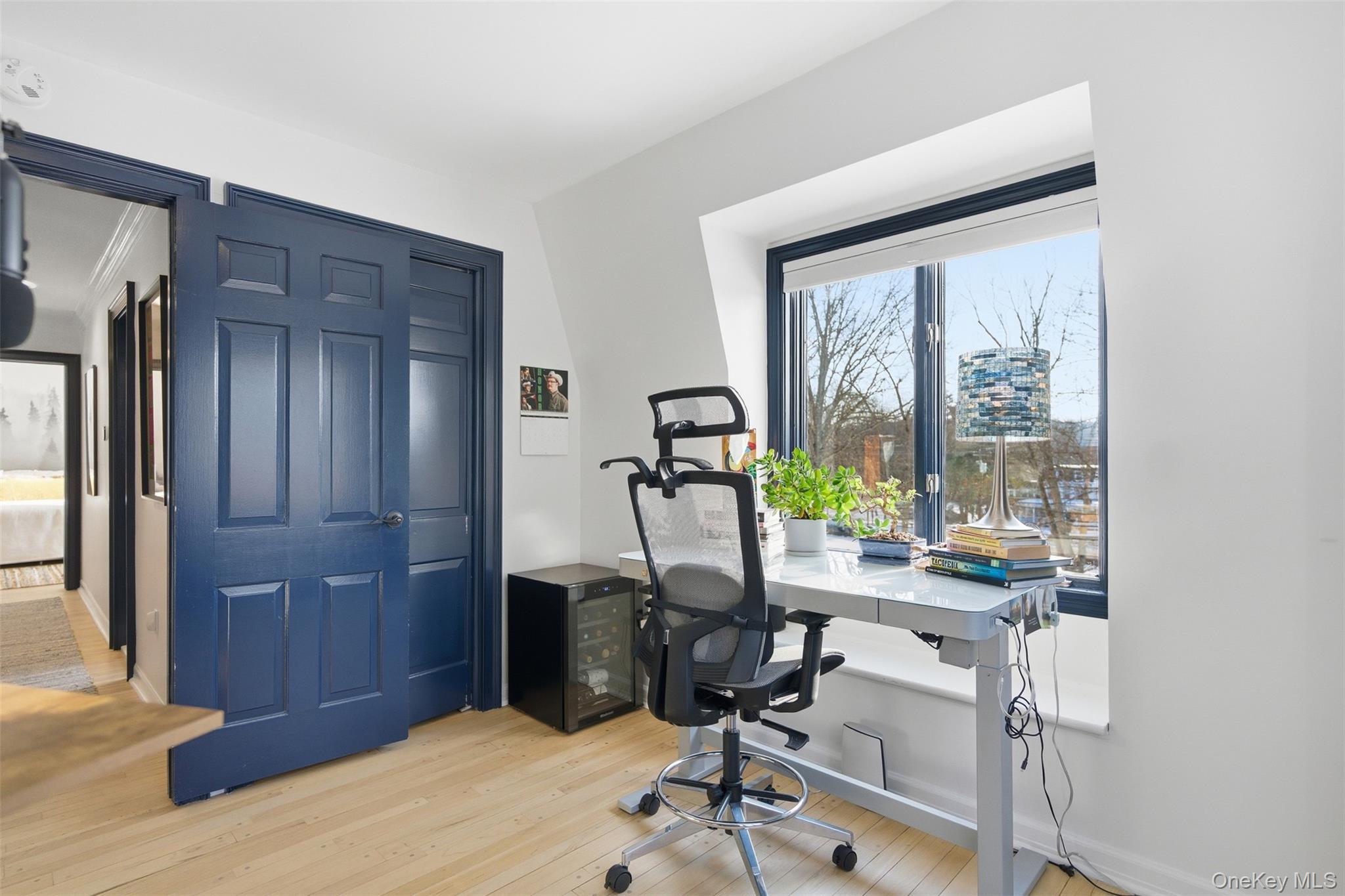 134 Fostertown Road Newburgh, NY 12550 - Photo 44 of 50 a view of a workspace with wooden floor and windows