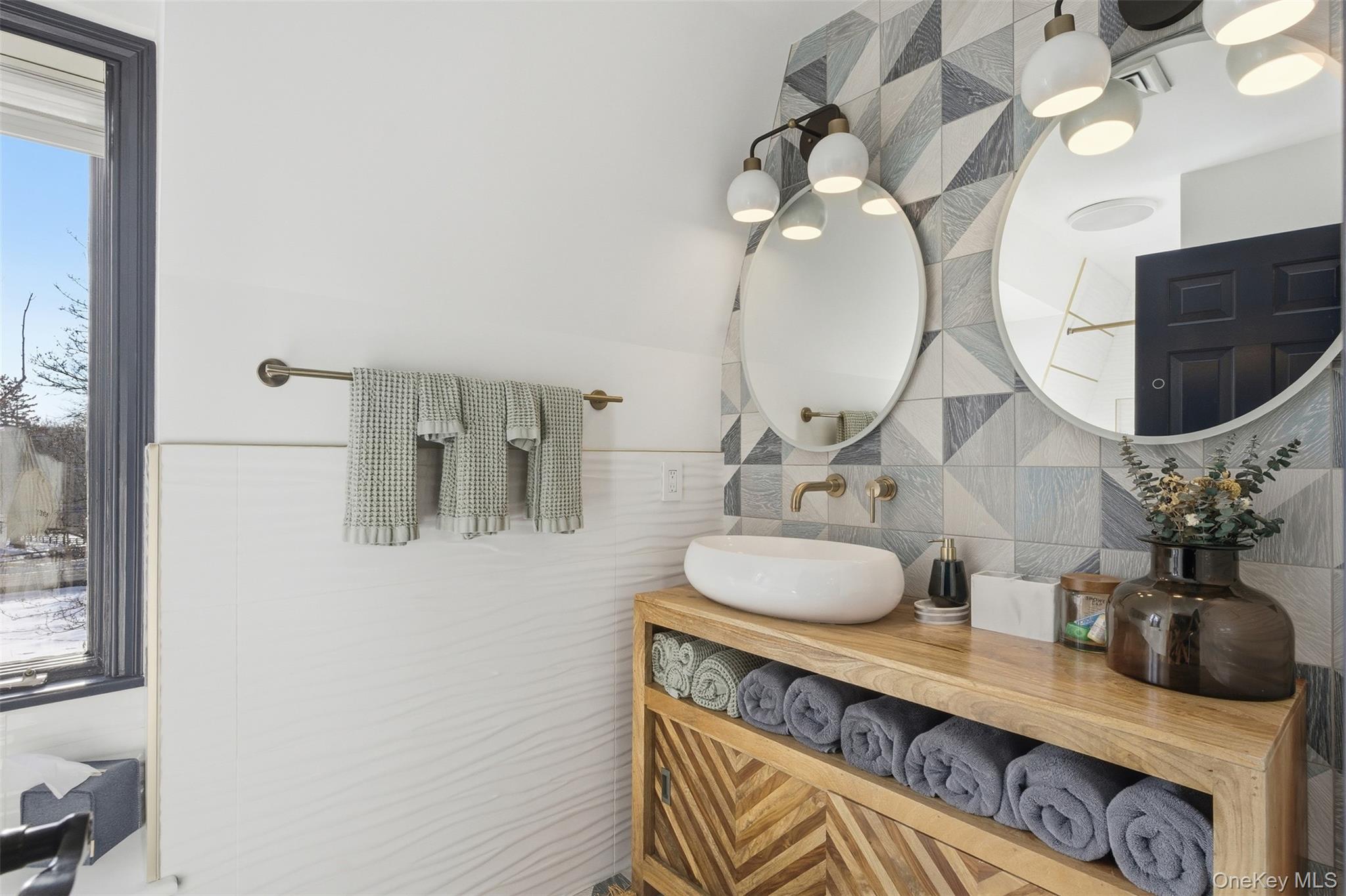 134 Fostertown Road Newburgh, NY 12550 - Photo 45 of 50 a bathroom with a sink and a mirror