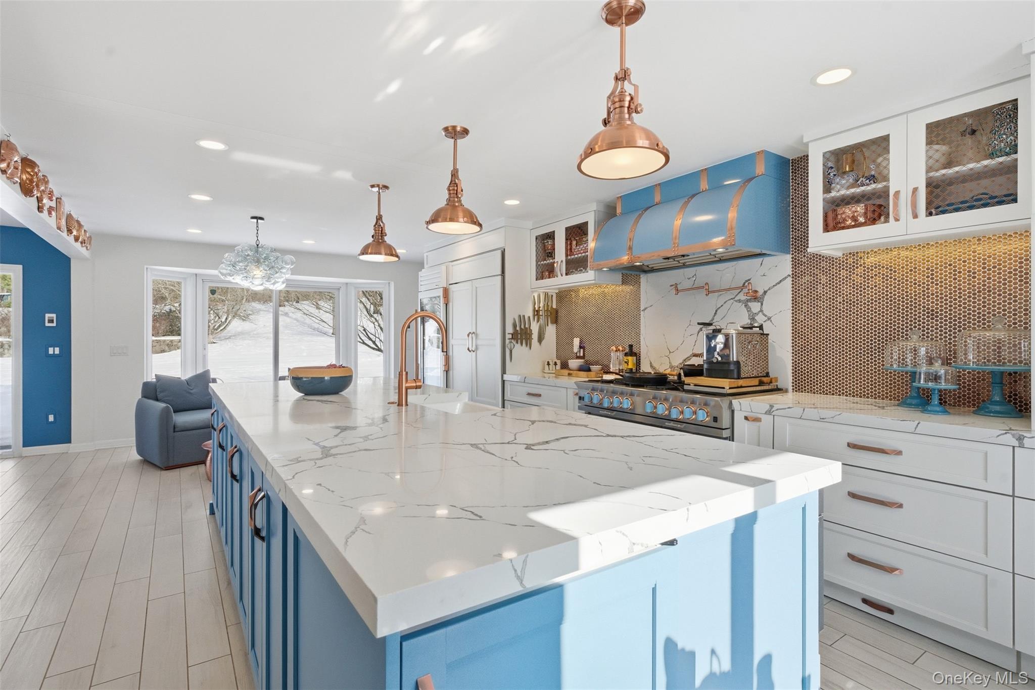 134 Fostertown Road Newburgh, NY 12550 - Photo 7 of 50 a kitchen with stainless steel appliances granite countertop a sink a stove and a wooden floors