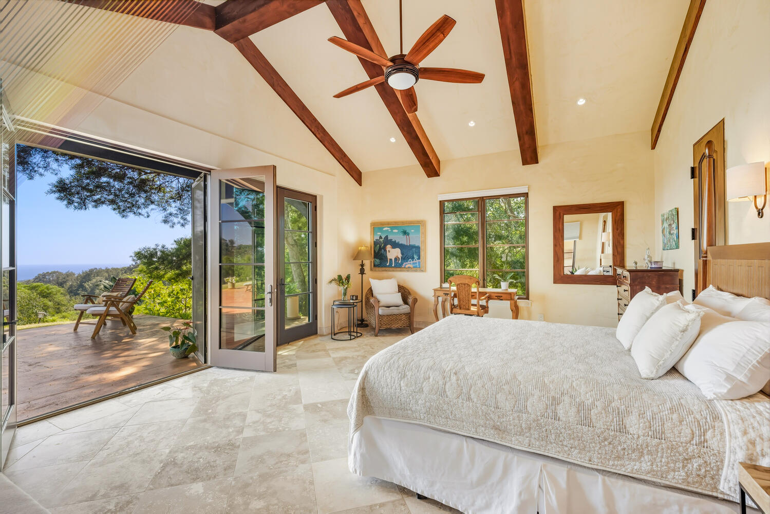 4114 Waha Road, Unit J Kalaheo, HI 96741 - Photo 12 of 30 a bed room with a bed and a large window