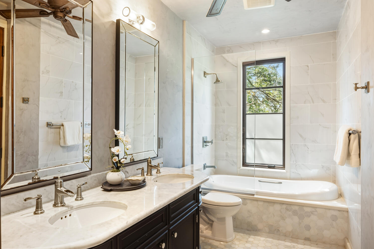4114 Waha Road, Unit J Kalaheo, HI 96741 - Photo 14 of 30 a bathroom with a tub sink and mirror