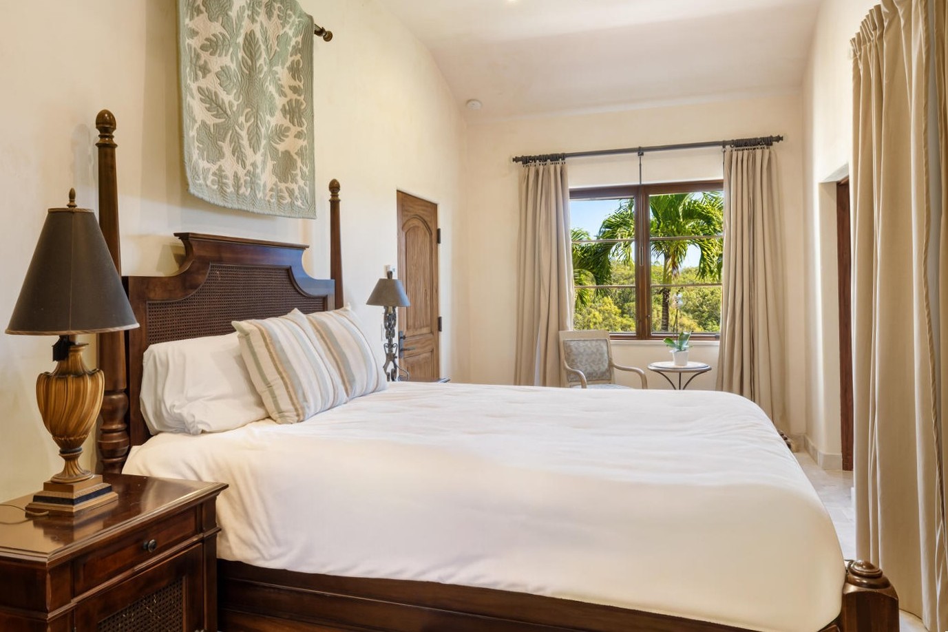 4114 Waha Road, Unit J Kalaheo, HI 96741 - Photo 28 of 30 a bedroom with a bed and a window