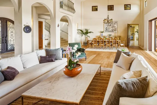 a living room with furniture and view of living room