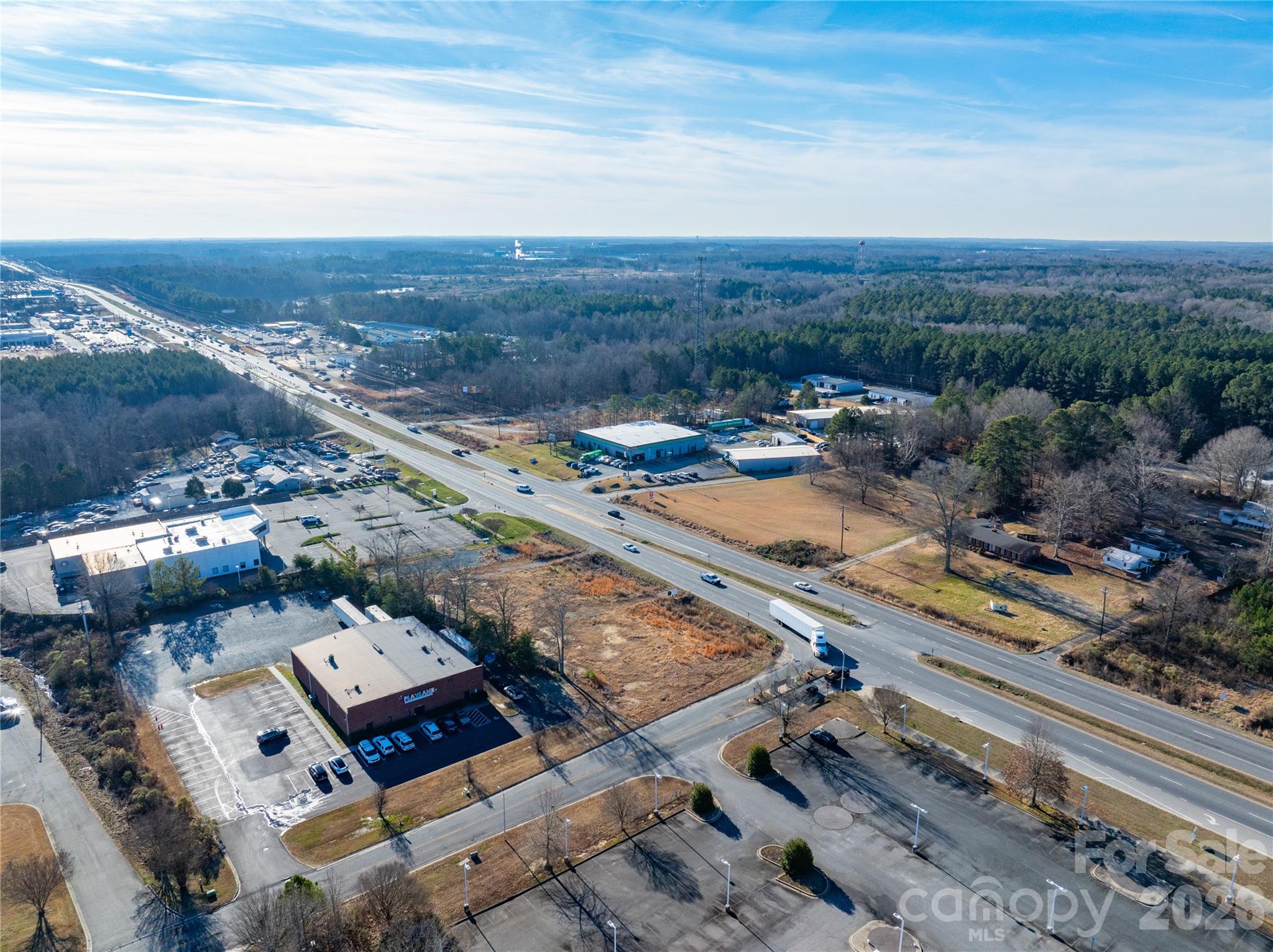 5116 West Highway 74 Monroe, NC 28110 - Photo 3 of 4 an aerial view of a city