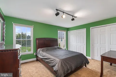 a room with pool table and flat screen tv