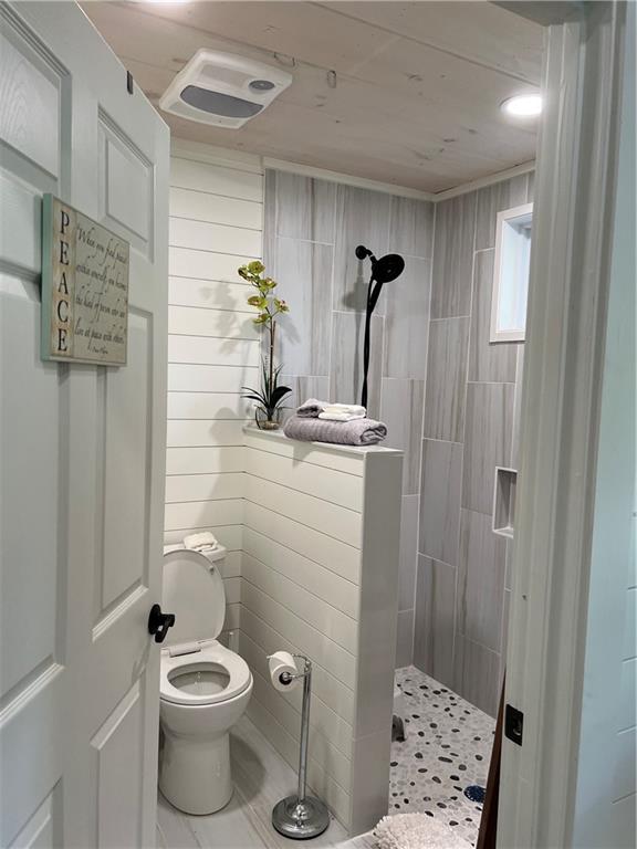 448 Hidden Valley Road Cleveland, GA 30528 - Photo 11 of 12 a bathroom with a toilet and a shower