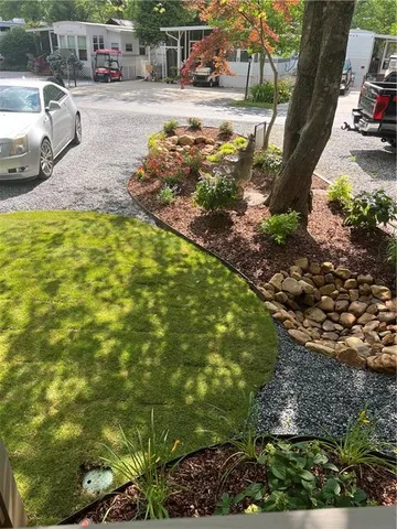 a view of yard with outdoor seating