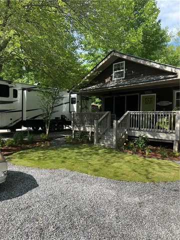 a front view of a house with swimming pool