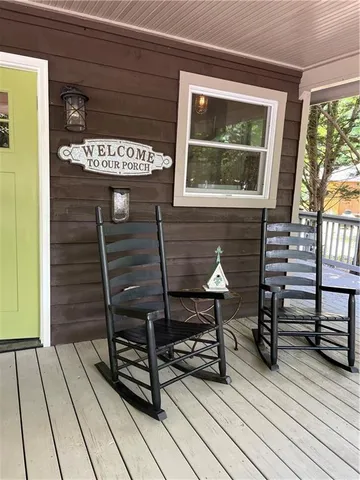 a view of a chairs setting on the deck
