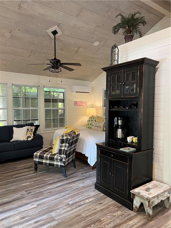 448 Hidden Valley Road Cleveland, GA 30528 - Photo 8 of 12 a living room with furniture and wooden floor