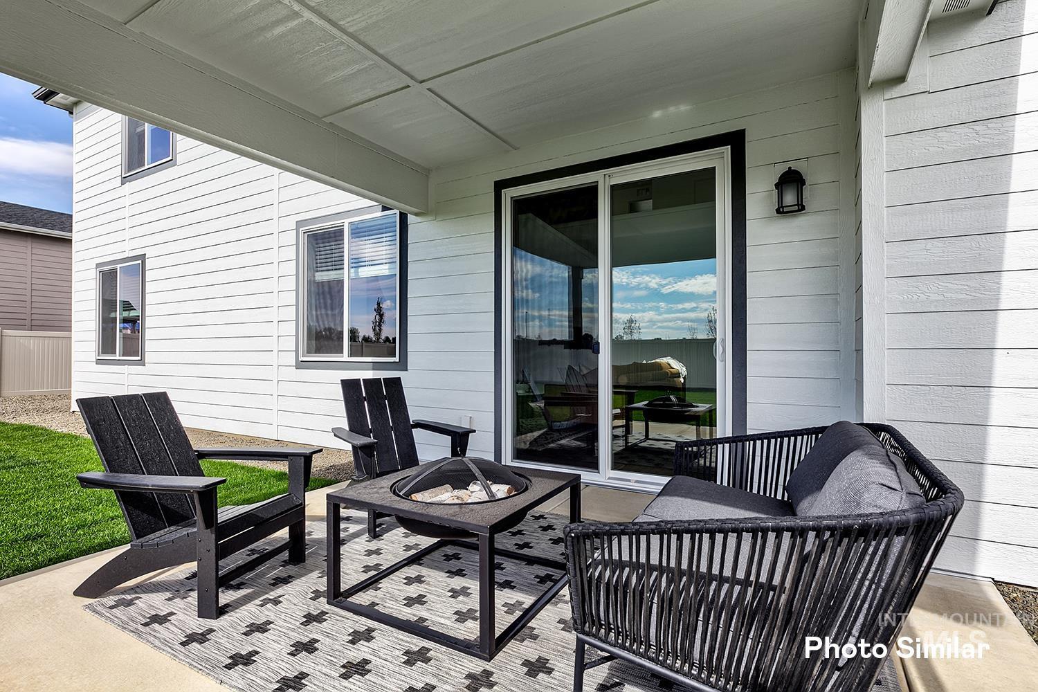 220 Ravello Street Caldwell, ID 83605 - Photo 32 of 35 View of patio with a fire pit