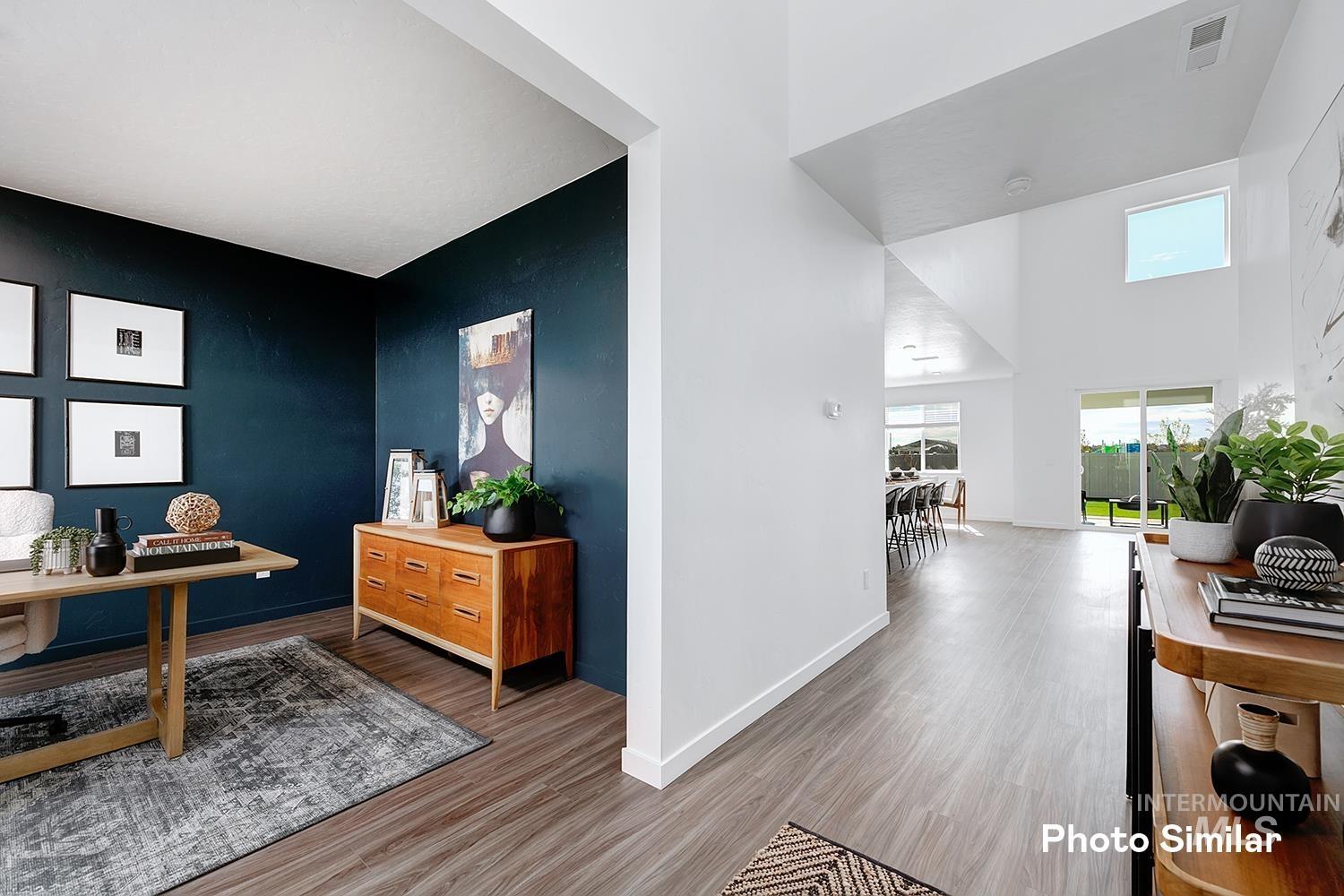 220 Ravello Street Caldwell, ID 83605 - Photo 5 of 35 Office featuring wood finished floors and a high ceiling