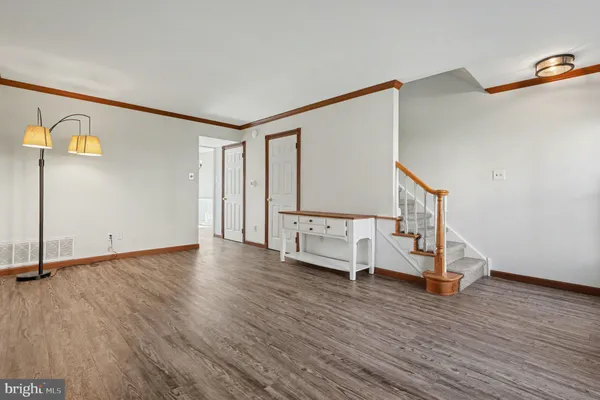 a view of entryway with wooden floor