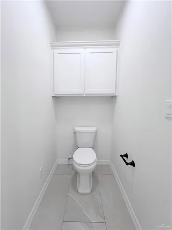 a view of a kitchen with a sink stainless steel appliances and cabinets
