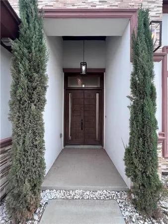 a front view of a house with a garage