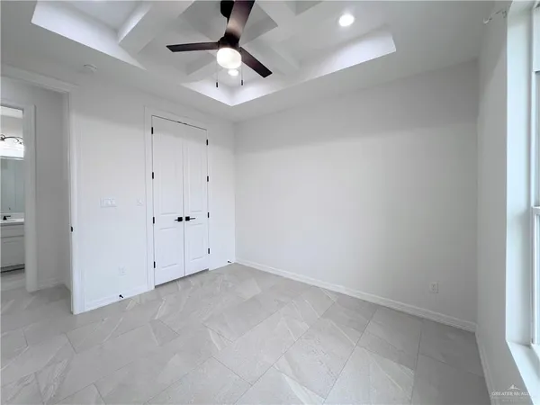 a view of an empty walk in closet