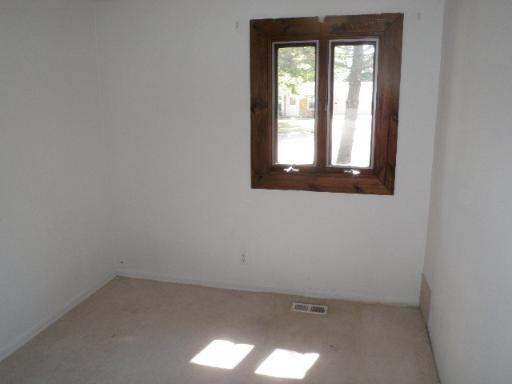 32 Marnel Road Montgomery, IL 60538 - Photo 8 of 12 an empty room that has a window