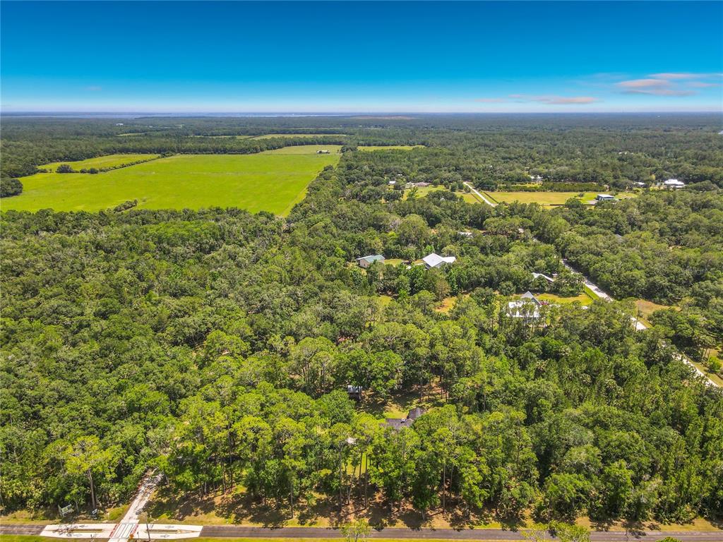 1395 Maytown Road Osteen, FL 32764 - Photo 58 of 65 a view of a city and an ocean