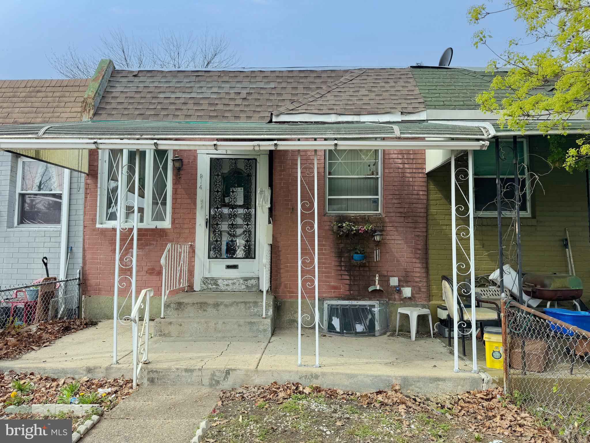 front view of a house with a patio