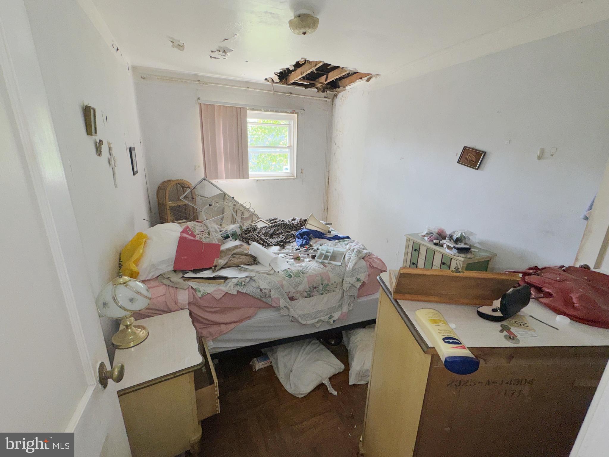 914 Burnside Road Sharon Hill, PA 19079 - Photo 11 of 13 a bedroom with a bed and a dresser