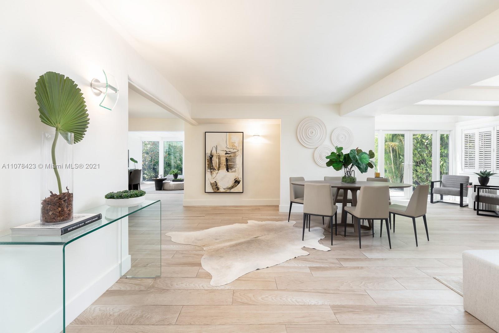 1812 Fairhaven Place Miami, FL 33133 - Photo 11 of 37 a living room with furniture rug and a window