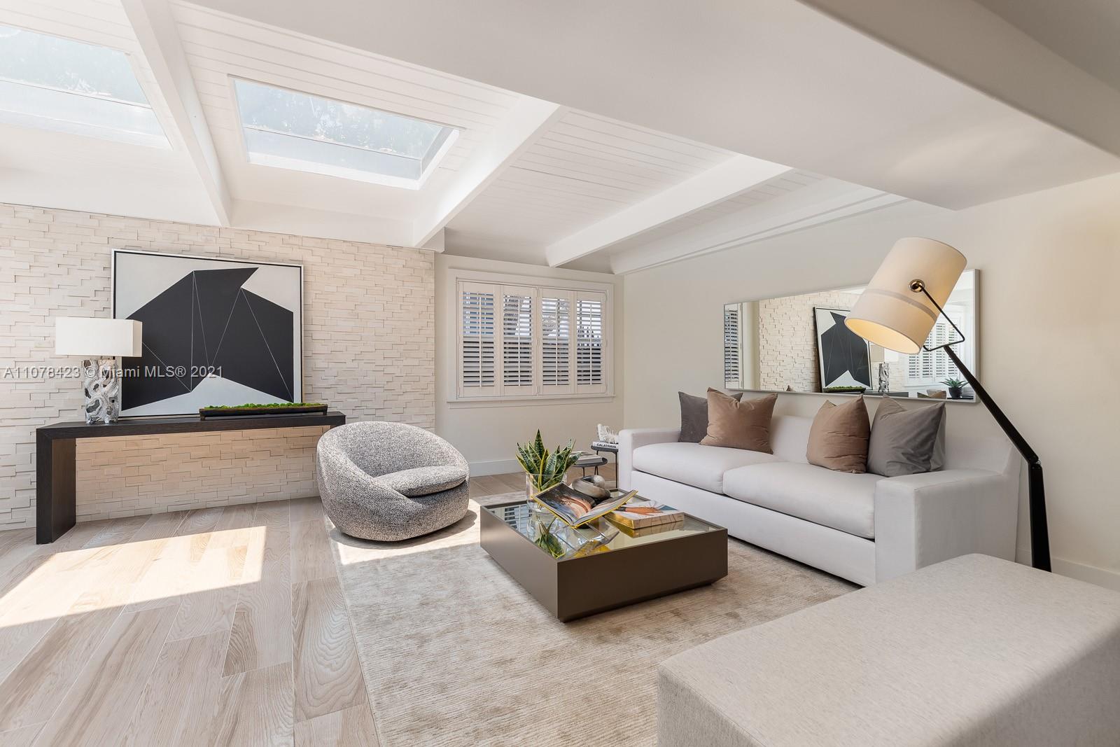 1812 Fairhaven Place Miami, FL 33133 - Photo 13 of 37 a living room with furniture