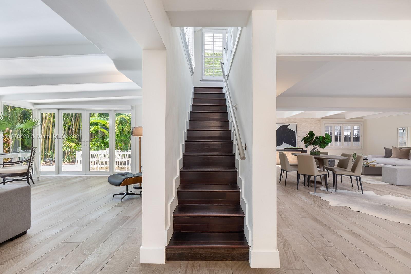 1812 Fairhaven Place Miami, FL 33133 - Photo 15 of 37 a view of entryway and hall with wooden floor