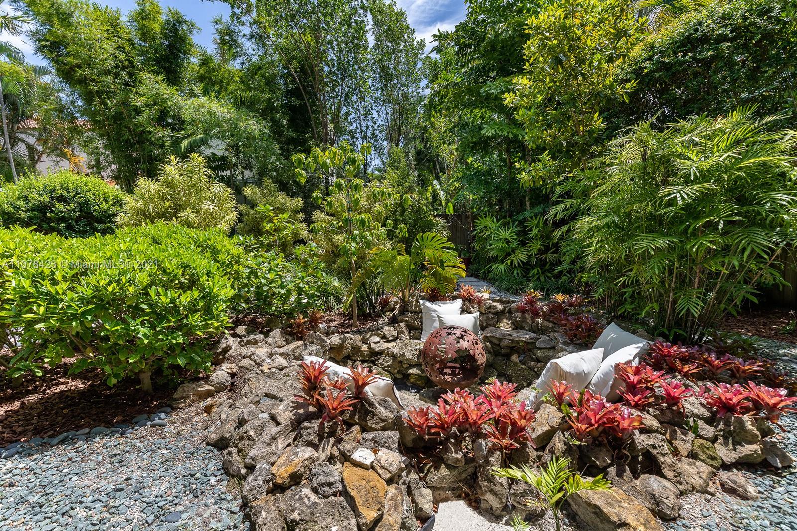 1812 Fairhaven Place Miami, FL 33133 - Photo 33 of 37 a view of a garden with flowers