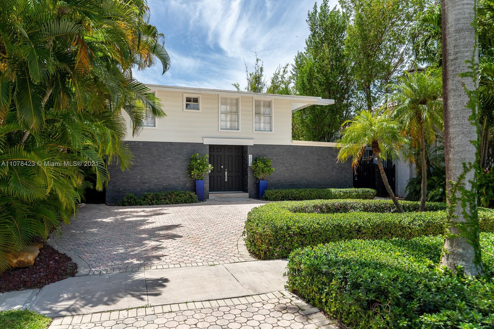 1812 Fairhaven Place Miami, FL 33133 - Photo 37 of 37 a view of house with yard and green space