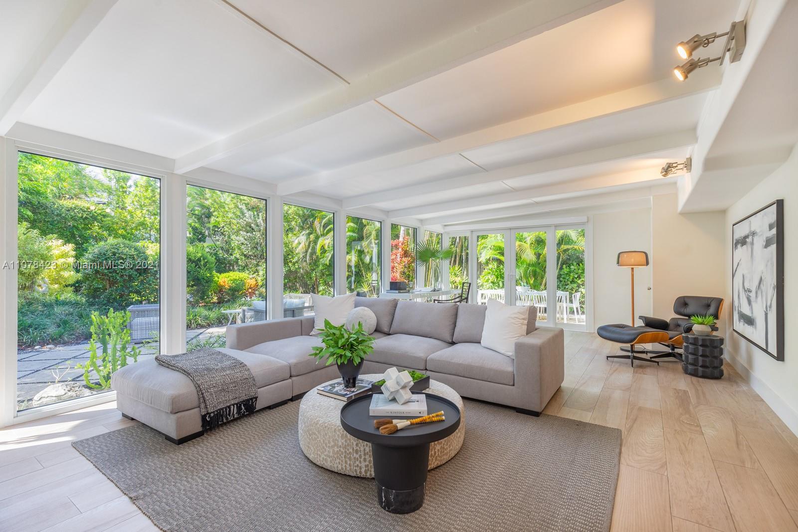 1812 Fairhaven Place Miami, FL 33133 - Photo 8 of 37 a living room with furniture and a large window