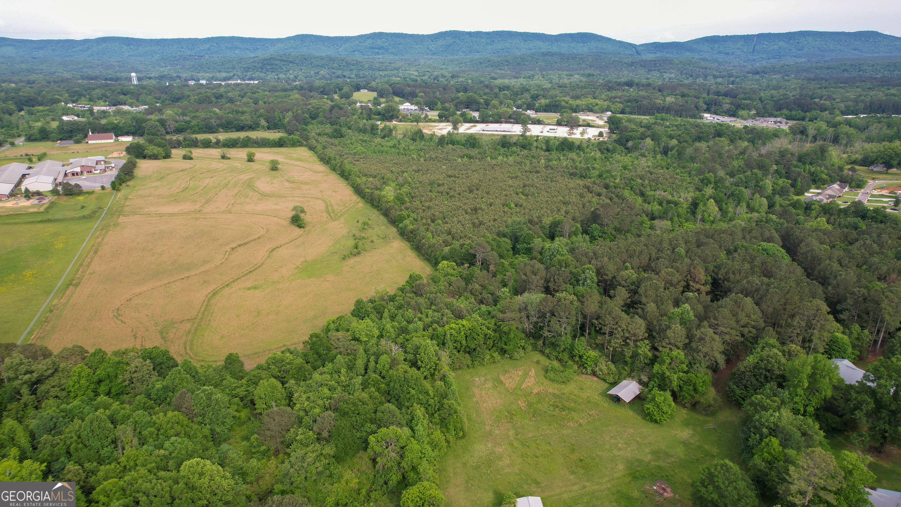 0 Lake Wanda Rita Summerville, GA 30747 - Photo 15 of 21 a view of a lake with mountains in the background