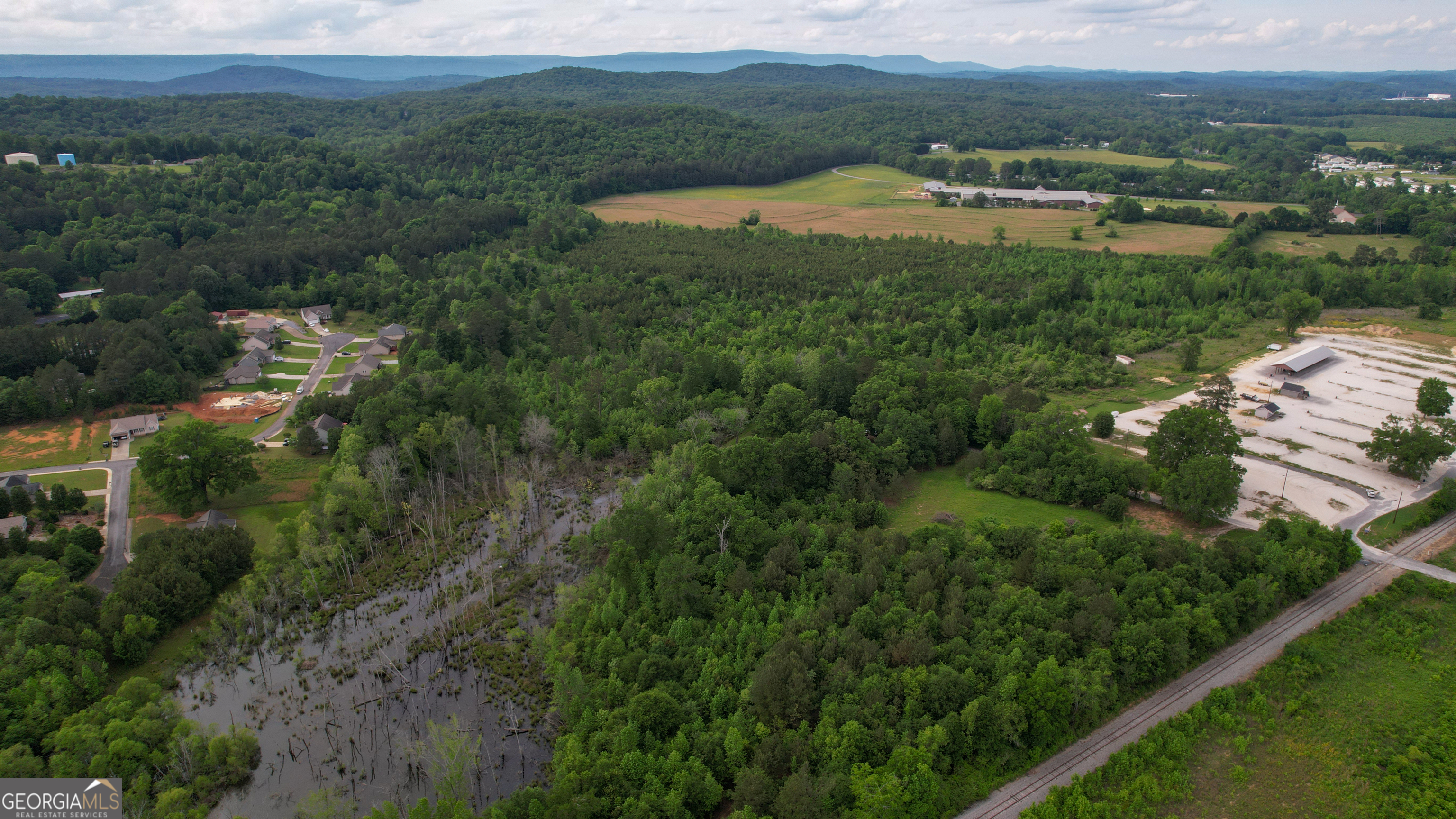 0 Lake Wanda Rita Summerville, GA 30747 - Photo 6 of 21 a view of a lake with houses in outdoor space