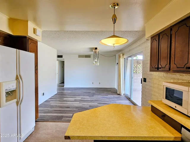 a view of an entryway with a chandelier