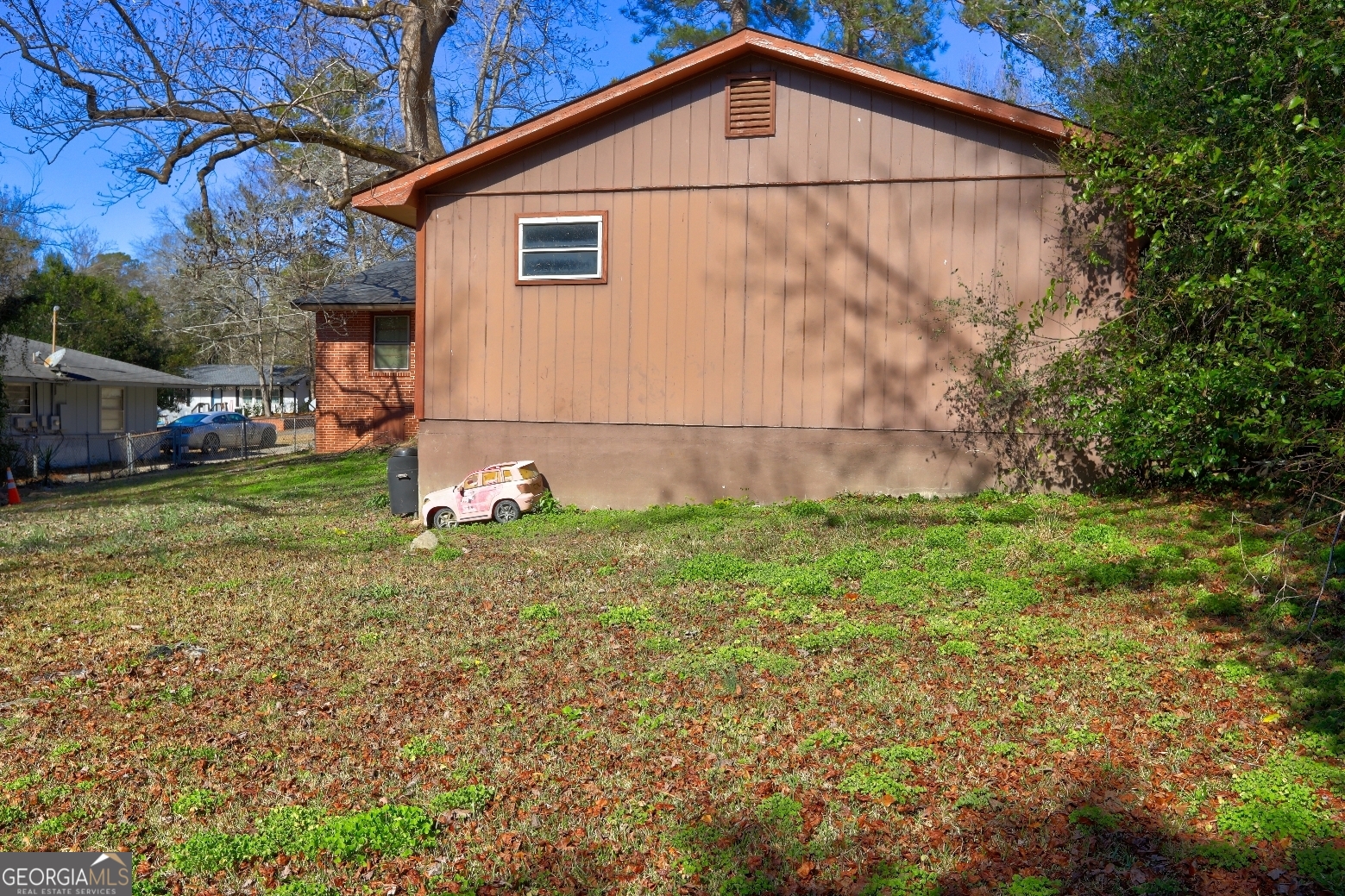 2918 Emerson Circle Macon, GA 31206 - Photo 4 of 8 a backyard of a house with lots of green space