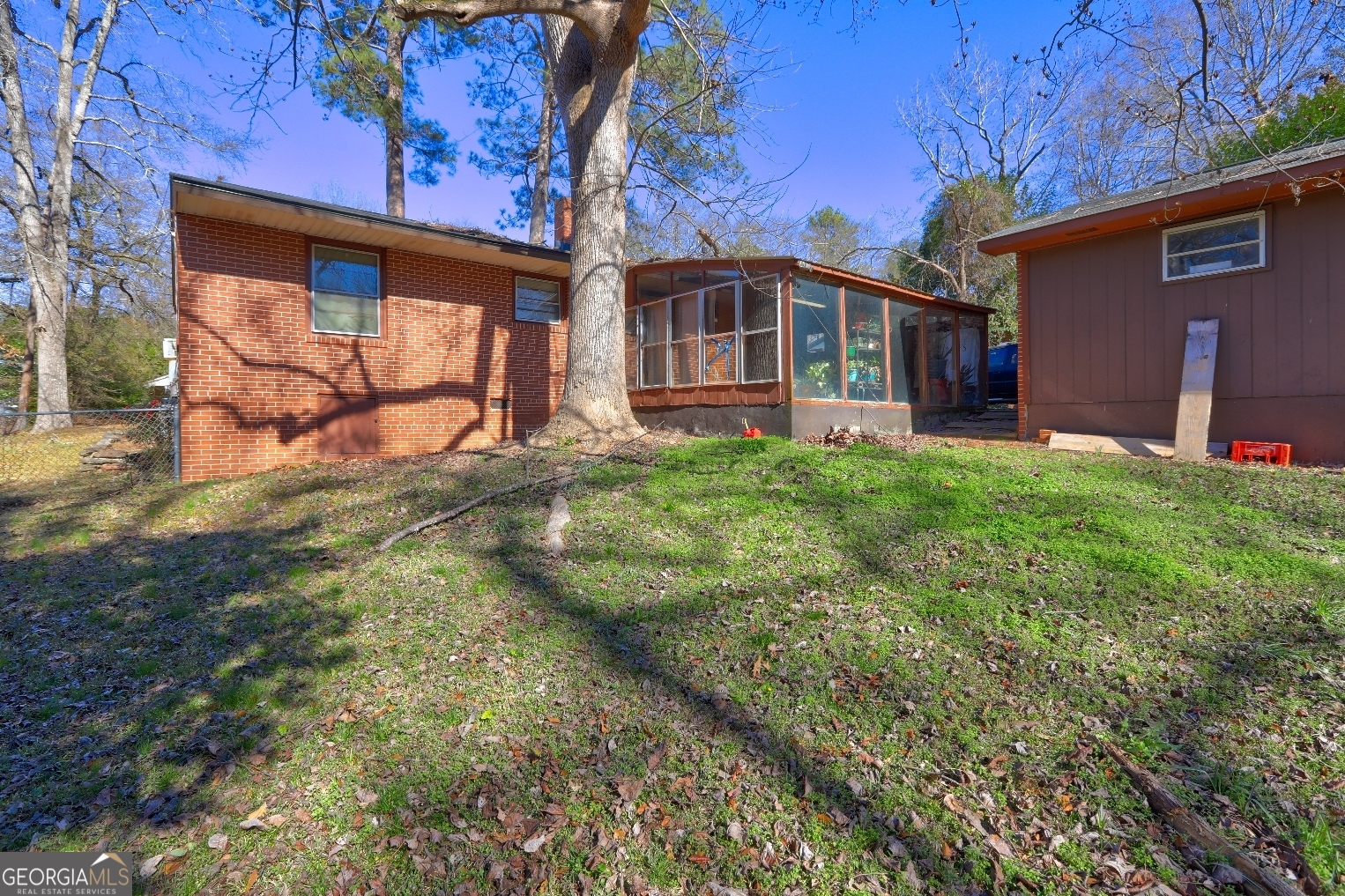 2918 Emerson Circle Macon, GA 31206 - Photo 5 of 8 a view of a house with backyard and sitting area