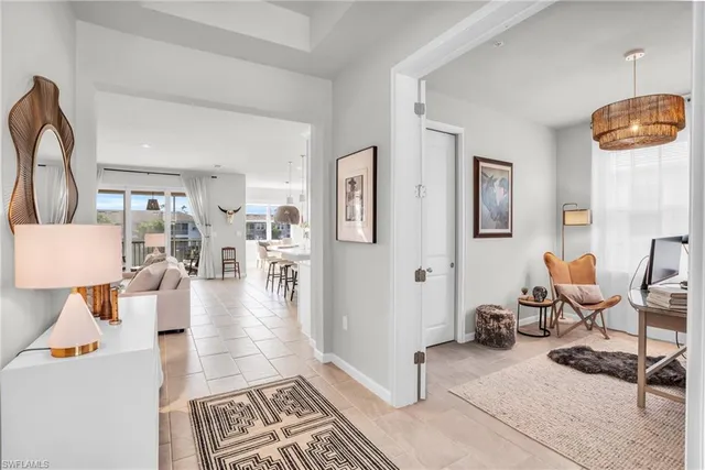 a living room with furniture and a table