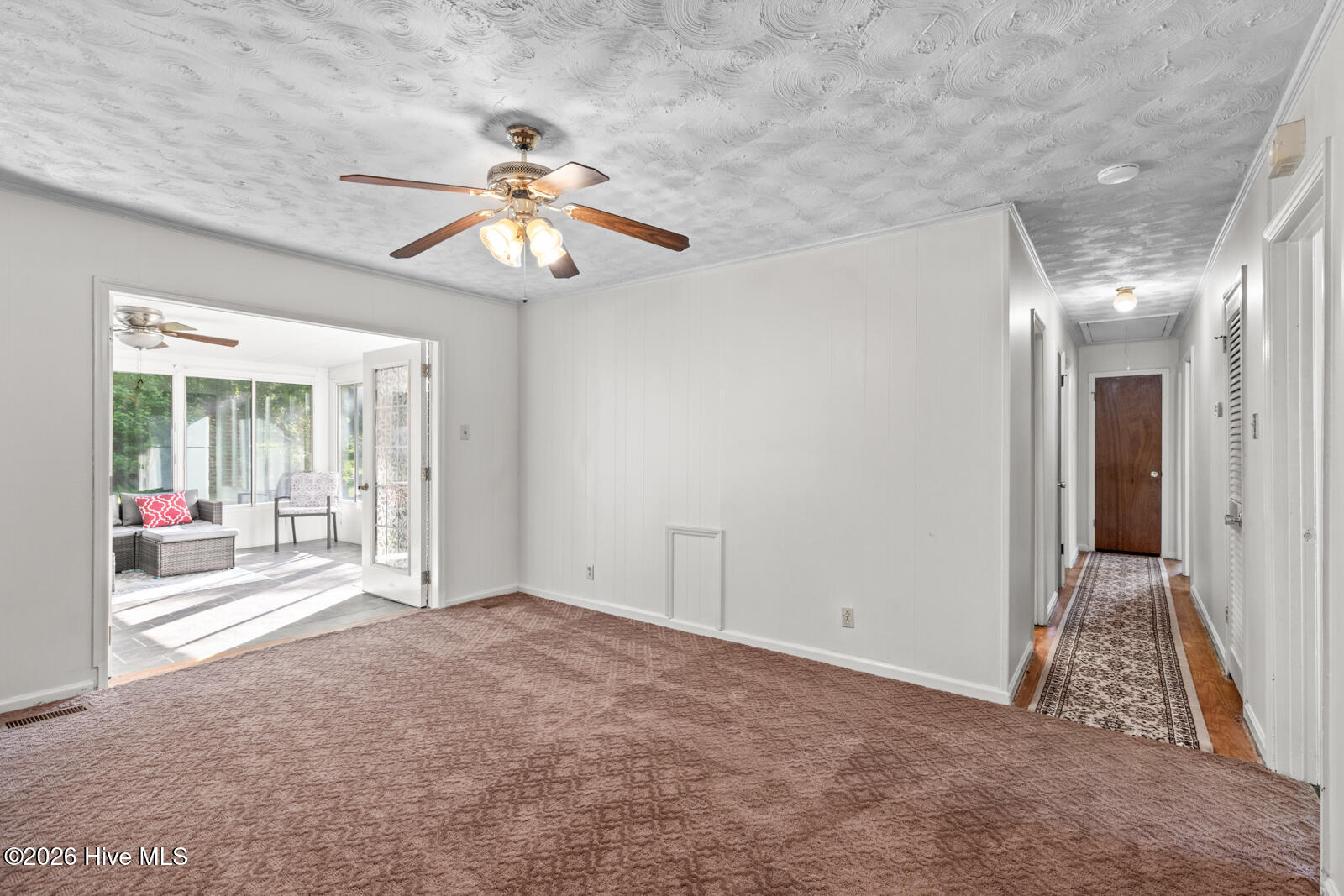 6 Laran Road Jacksonville, NC 28540 - Photo 21 of 41 The Family Room, Leading Into The Sunroom