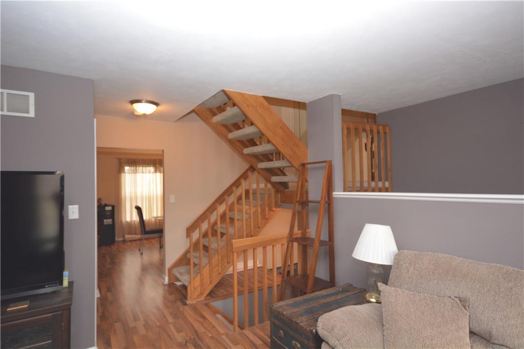 218 Grace Street McKees Rocks, PA 15136 - Photo 12 of 22 Open staircase.