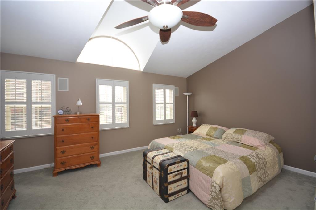 218 Grace Street McKees Rocks, PA 15136 - Photo 13 of 22 Master bedroom features interior shutters, palladium window and vaulted ceiling.