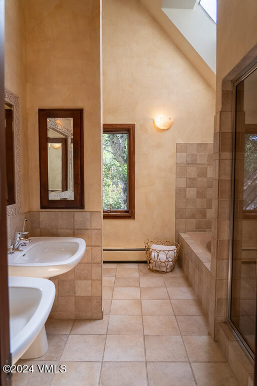 850 Eagle Drive Eagle-Vail, CO 81620 - Photo 14 of 32 a bathroom with a sink a toilet and tub
