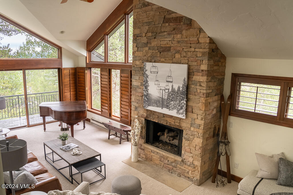 850 Eagle Drive Eagle-Vail, CO 81620 - Photo 15 of 32 a living room with furniture and a fireplace