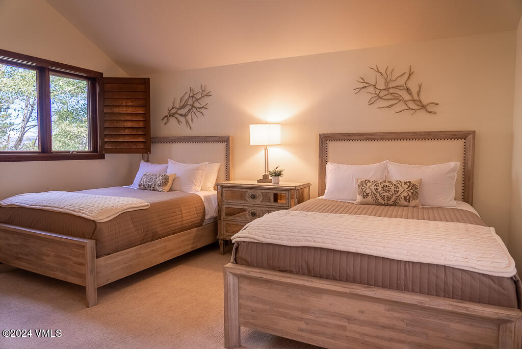 850 Eagle Drive Eagle-Vail, CO 81620 - Photo 17 of 32 a bedroom with bed and window