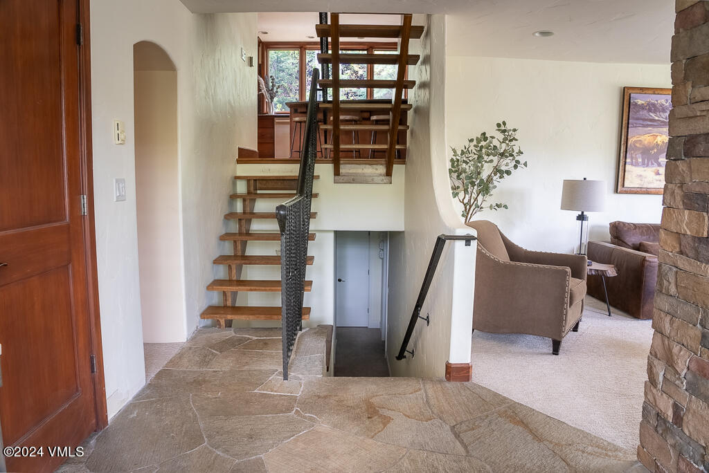 850 Eagle Drive Eagle-Vail, CO 81620 - Photo 2 of 32 a living room with furniture and wooden floor