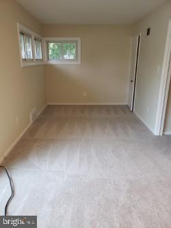 6909 Quander Road Alexandria, VA 22307 - Photo 12 of 36 LIVING ROOM AS SEEN FROM THE DINING AREA