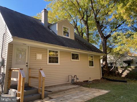 6909 Quander Road Alexandria, VA 22307 - Photo 29 of 36 FACING BACK OF THE HOUSE FROM THE DECK