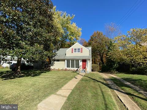 6909 Quander Road Alexandria, VA 22307 - Photo 5 of 36 VIEW OF FRNT OF HOUSE W/CONCRETE WLKWY & DW STRIPS