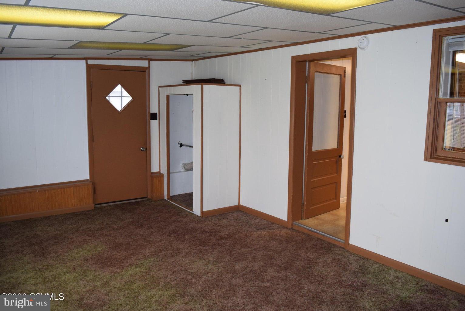 123 Center Street Milton, PA 17847 - Photo 13 of 13 Spacious room with potential charm.